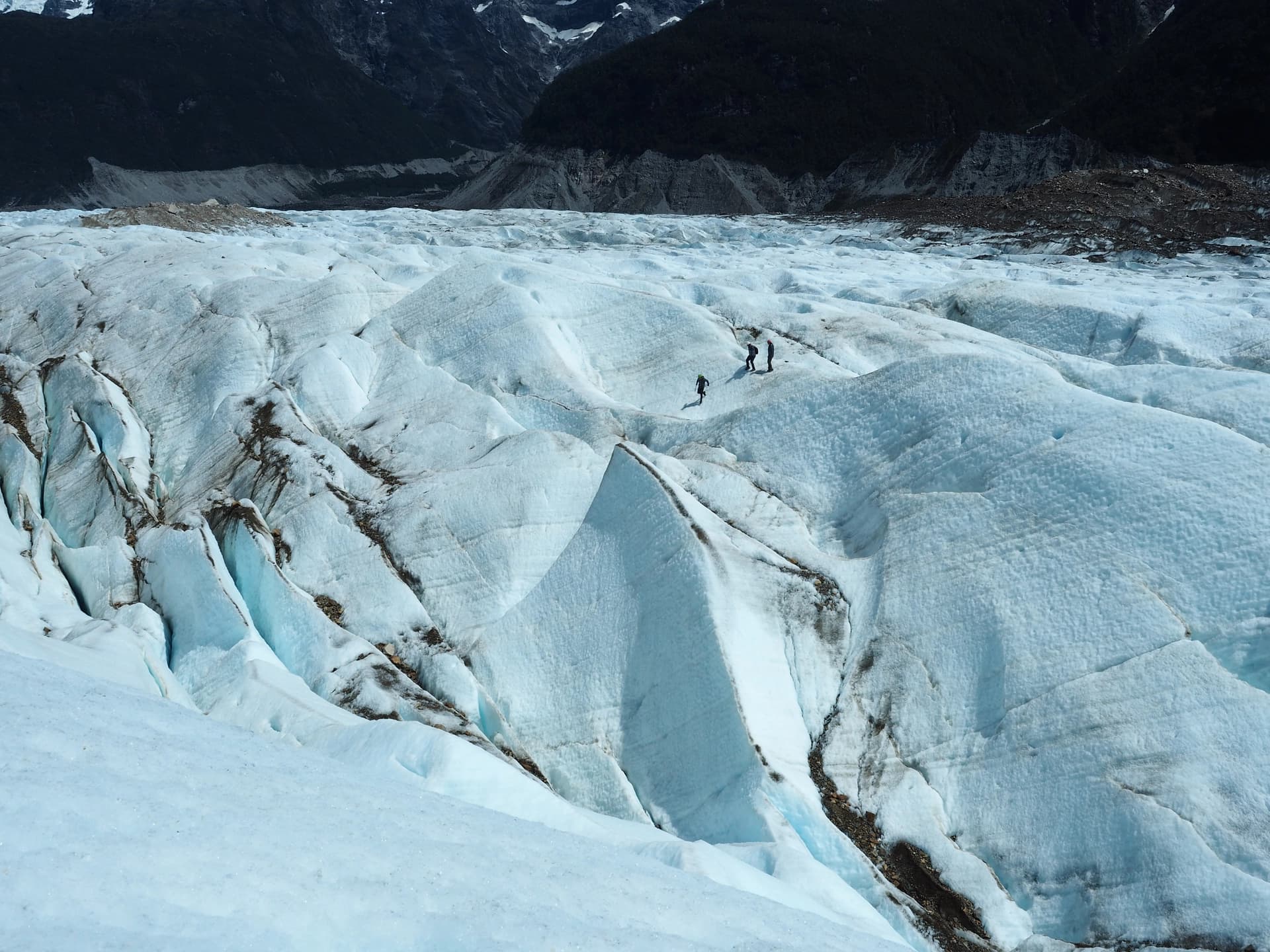 Detail of the Explorades glacier with 3 persons